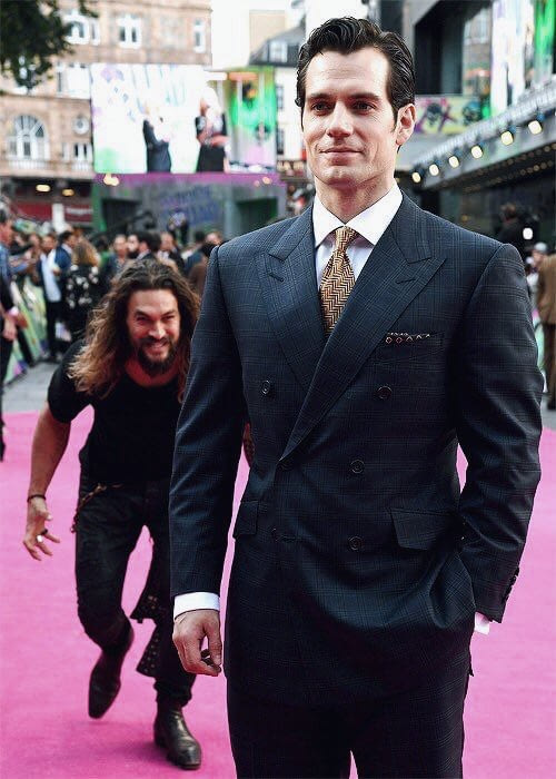 Aquaman Sneaking up on Superman meme template