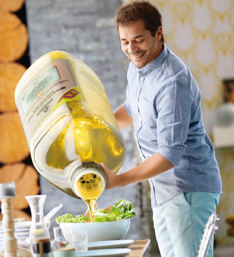 Guy pouring olive oil on the salad meme template